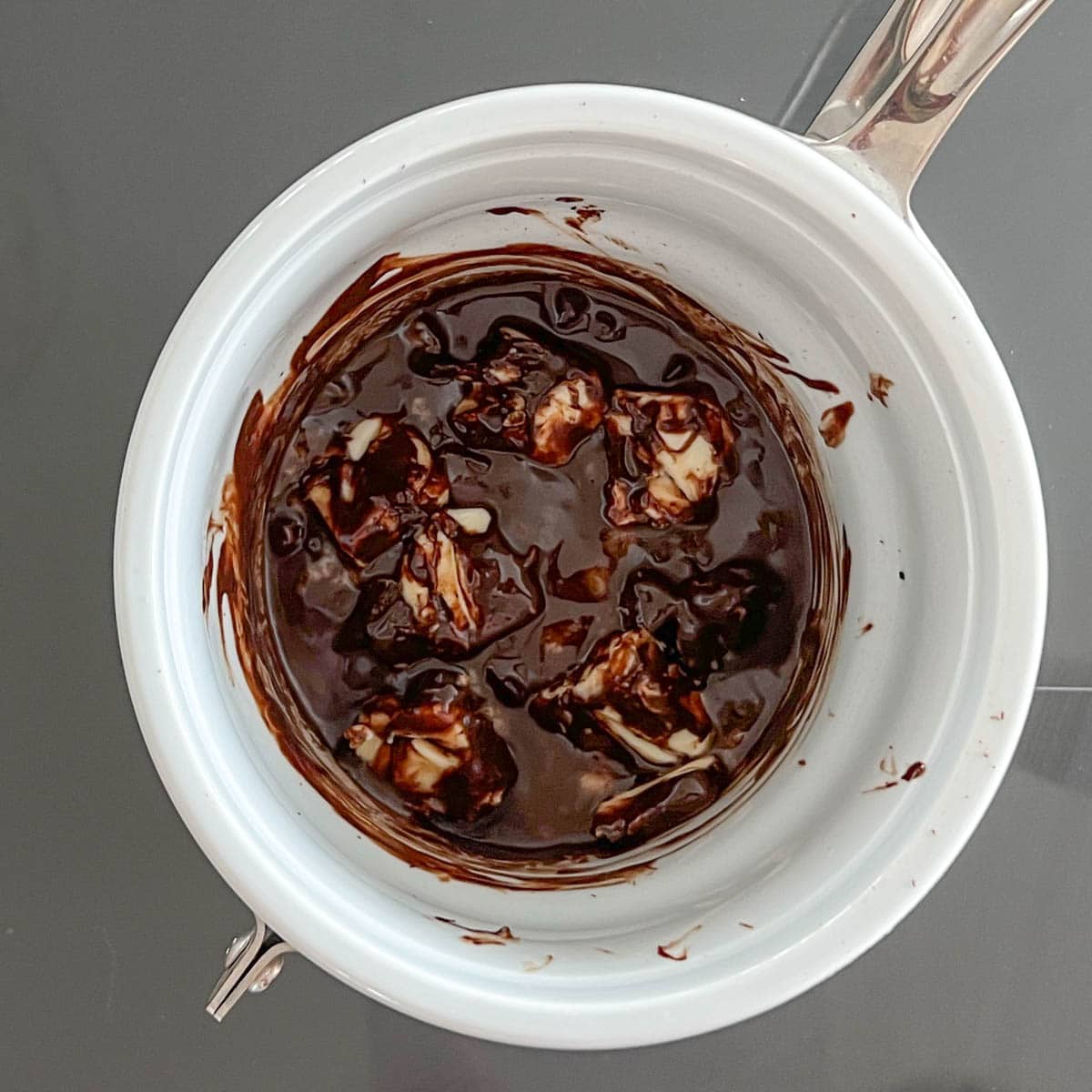 View of melting chocolate and butter in double boiler
