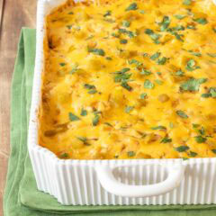 View of Layered Chicken Enchilada Casserole showing cilantro garnish on top